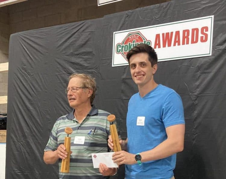 Justin Slater and Fred Slater on the podium for first place in the 2024 World Crokinole Championship doubles division